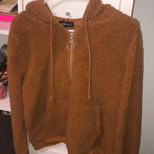 Quarter zip sweater.